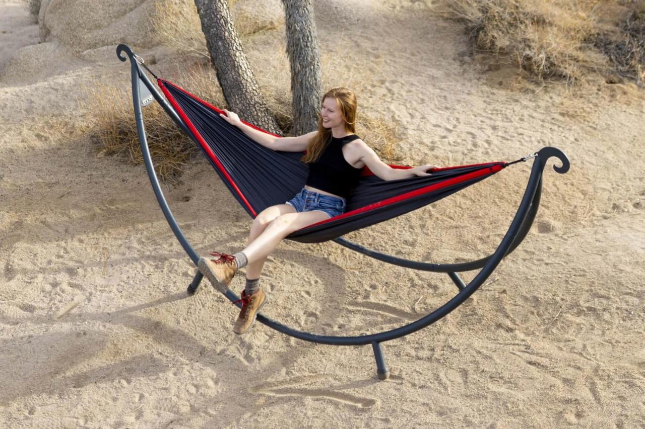 Comfortable hammock in a stand for lounging outdoors